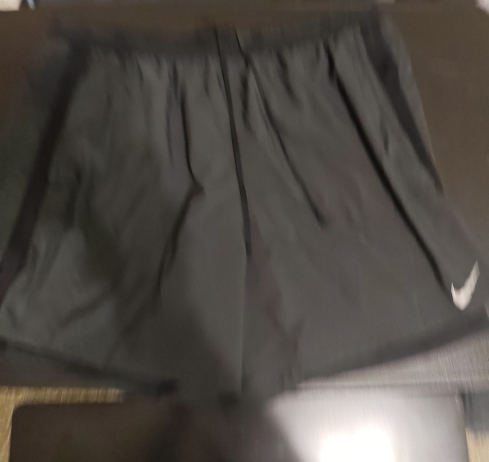 Nike Black Men’s Athletic Shorts with Silver Swoosh